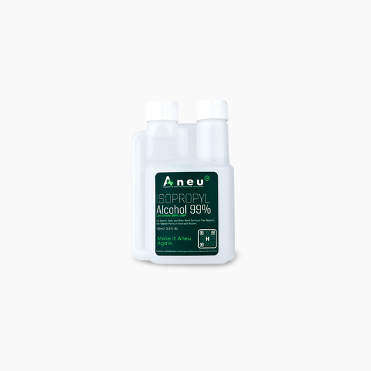 Bottle of Aneu isopropyl alcohol 99% on a white background
