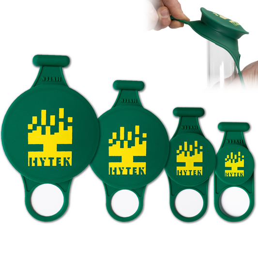 Green silicone bong cleaning caps with yellow 'HYTEK' logo on a white background