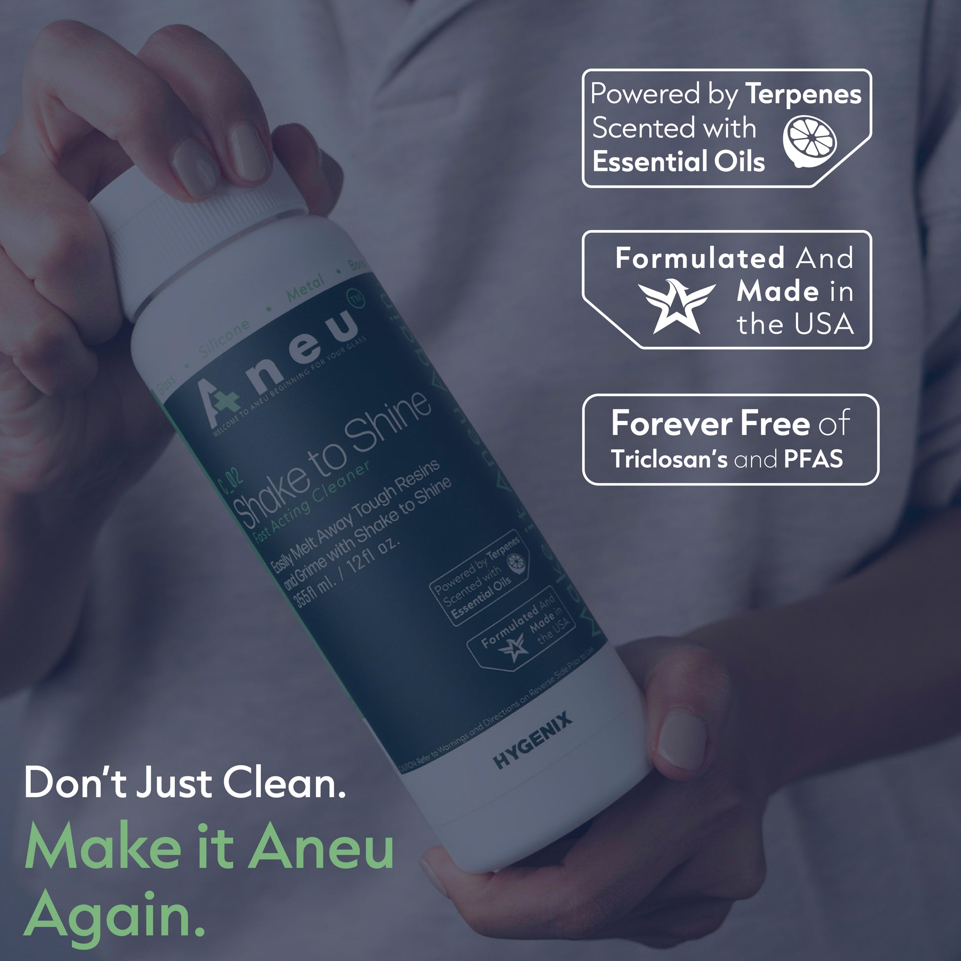 Women holding a bottle of shake to shine bong cleaner at an angle